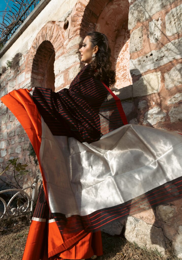Self stripes pattern with broad silk border saree
