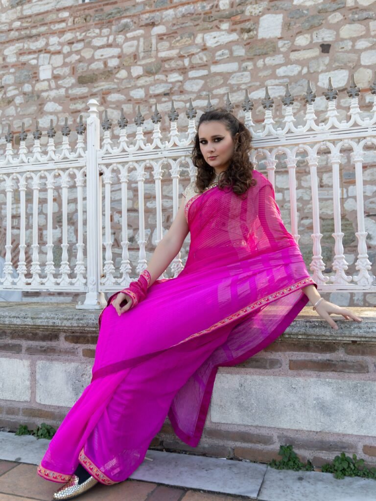 Chiffon saree with self checks Design embellished with Parsi border