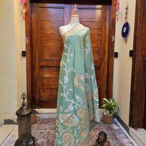 Sea green katan silk dupatta with silver thread pattern,parrots motifs, cutwork