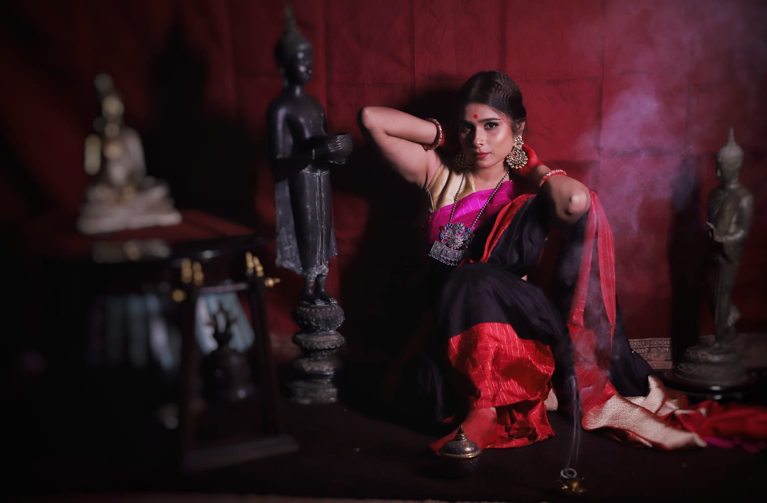 Shikargah motifs in banarasi katan silk with satin border embroidery with figurines motifs.